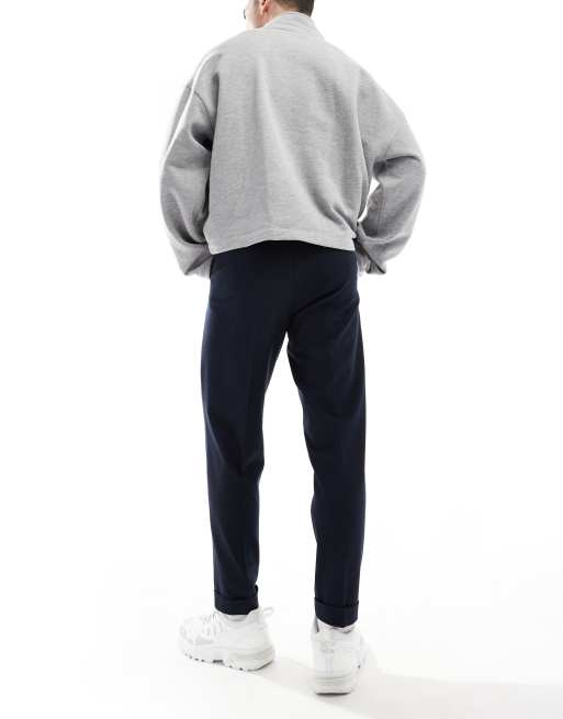 ASOS DESIGN – Elegante, schmal zulaufende Schlupf-Chinohose in Marineblau