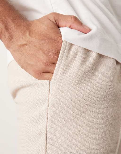 ASOS DESIGN smart tapered fit wool mix pants with front pleat in stone