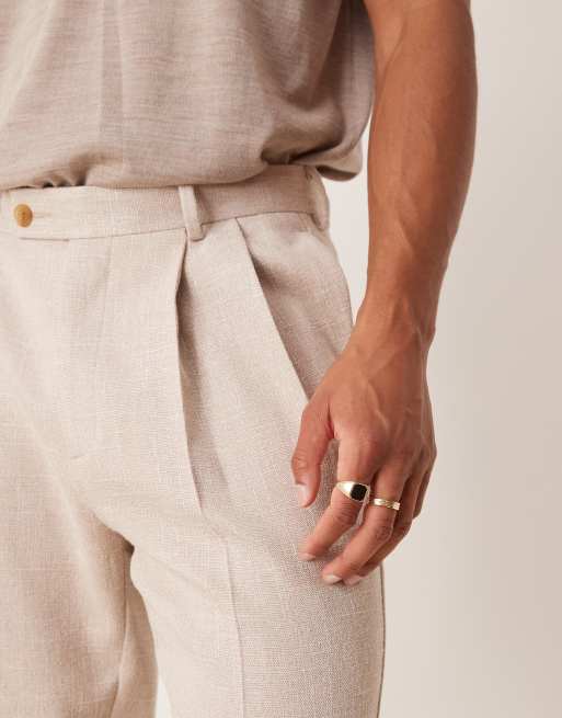ASOS DESIGN smart tapered pants in neutral texture with front pleat and turn ups