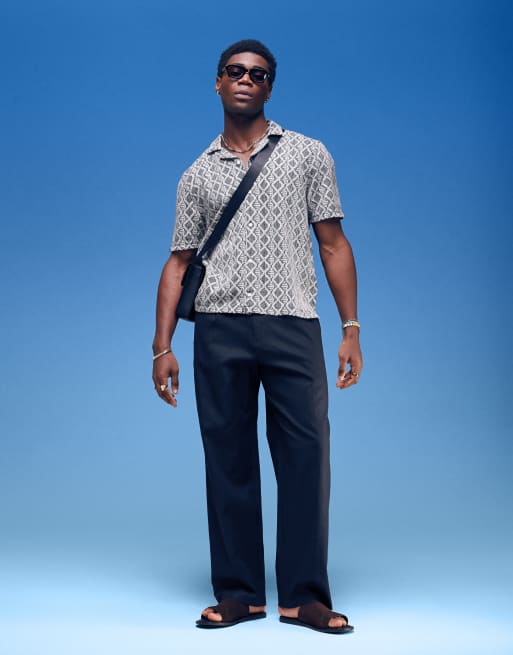 ASOS DESIGN – Elegante, weit geschnittene Hose aus Leinenmix in Schwarz mit Bundfalten