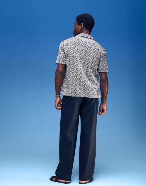 ASOS DESIGN – Elegante, weit geschnittene Hose aus Leinenmix in Schwarz mit Bundfalten