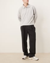 ASOS DESIGN boxy oversized polo shirt with cut and sew paneling and city graphics in cream