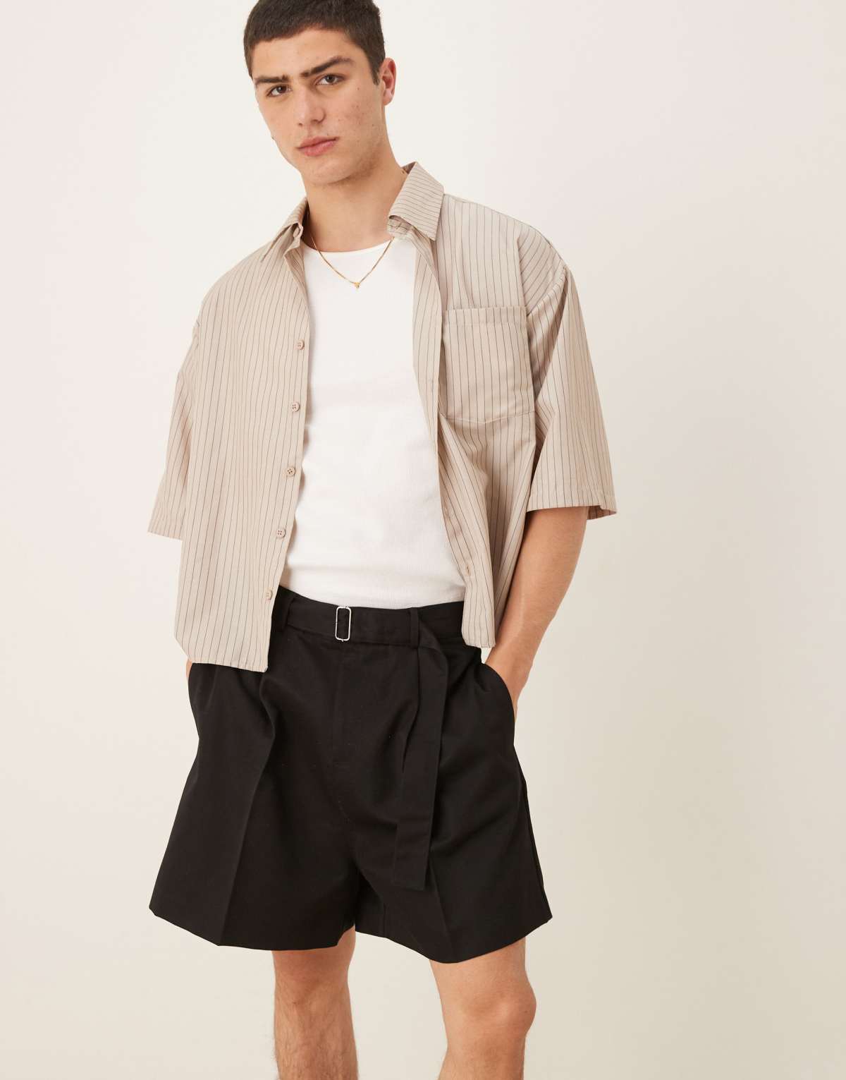 ASOS DESIGN smart wide longline shorts with front pleat and belt detail in black