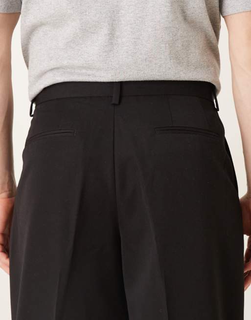 ASOS DESIGN – Smarte Hose in Schwarz mit weitem Bein und Bundfalten, 5 von 5