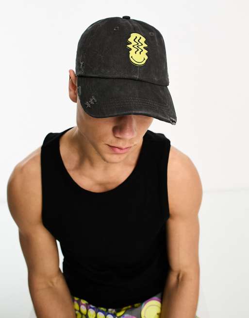 ASOS DESIGN Smiley Collab soft baseball cap with rubberized logo in  distressed black