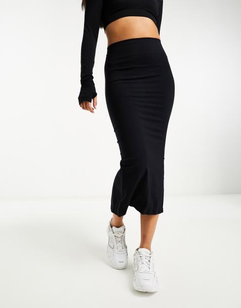 ASOS DESIGN - Sømløs, formgivende tube-midinederdel i sort - Del af sæt - view 1