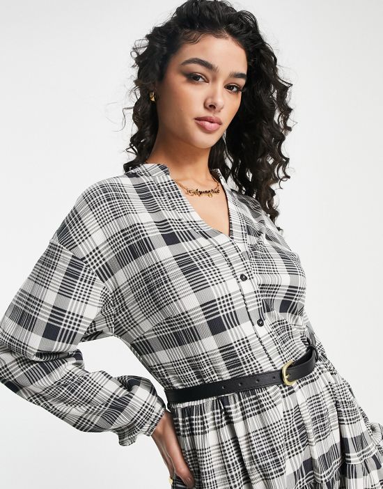 https://images.asos-media.com/products/asos-design-smock-button-through-romper-with-belt-in-mono-check/202185042-4?$n_550w$&wid=550&fit=constrain