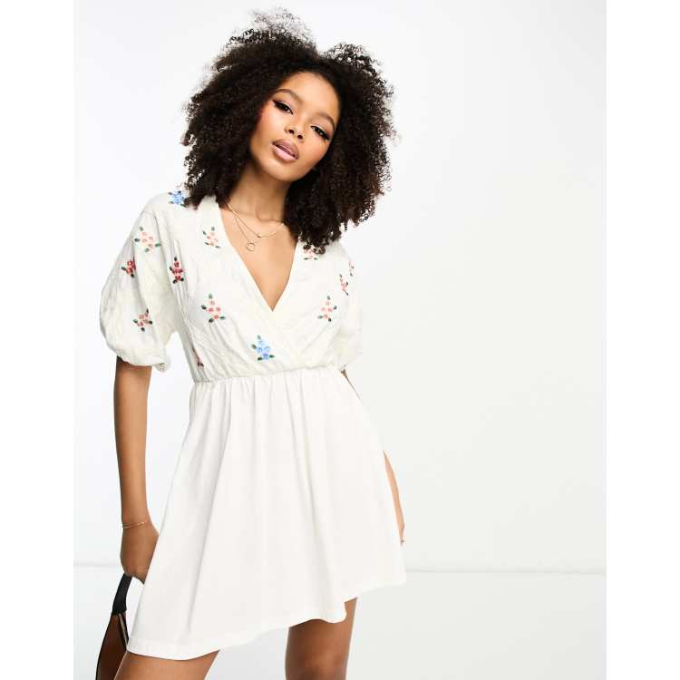 ASOS DESIGN smock mini dress with cross lace insert and embroidery in cream