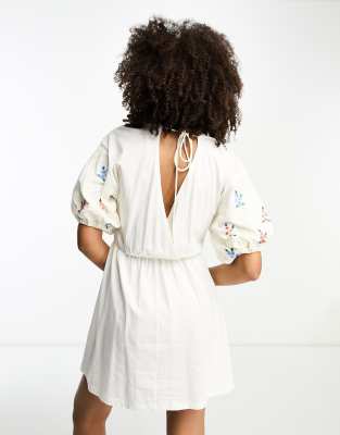 ASOS DESIGN smock mini dress with cross lace insert and embroidery in cream