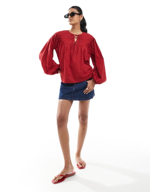 ASOS DESIGN smock top with lace up neck detail in burgundy