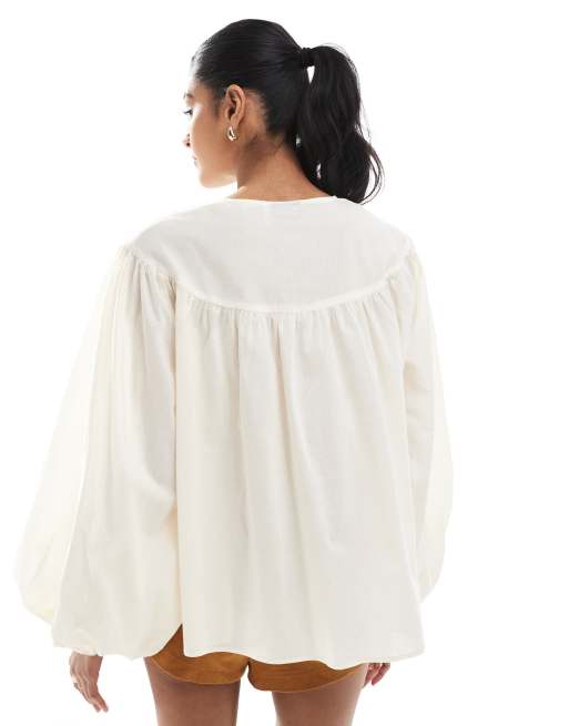 ASOS DESIGN smock top with lace up neck detail in stone