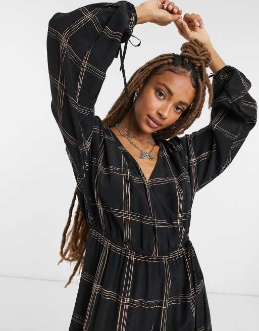 ASOS DESIGN smock wrap jumpsuit in dark check print