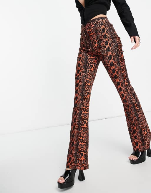 ASOS DESIGN snakeskin print flare pants in multi