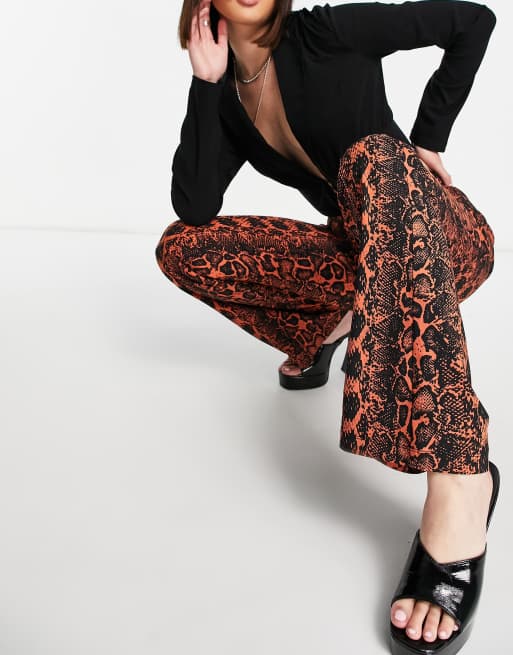 ASOS DESIGN smart flared pants in bronze snake pattern