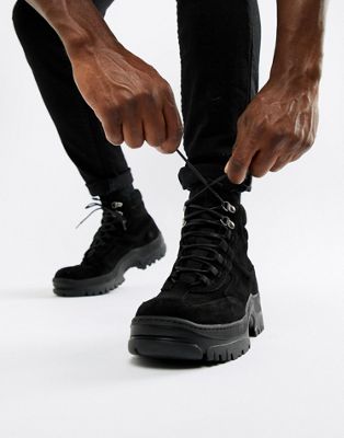 black leather sneaker boots