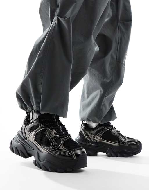 ASOS DESIGN – Sneaker in Schwarz mit Metallic-Einsätzen und dicker Sohle