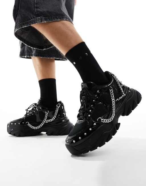 ASOS DESIGN Sneaker in Schwarz mit Nietenbesatz und dicker Sohle