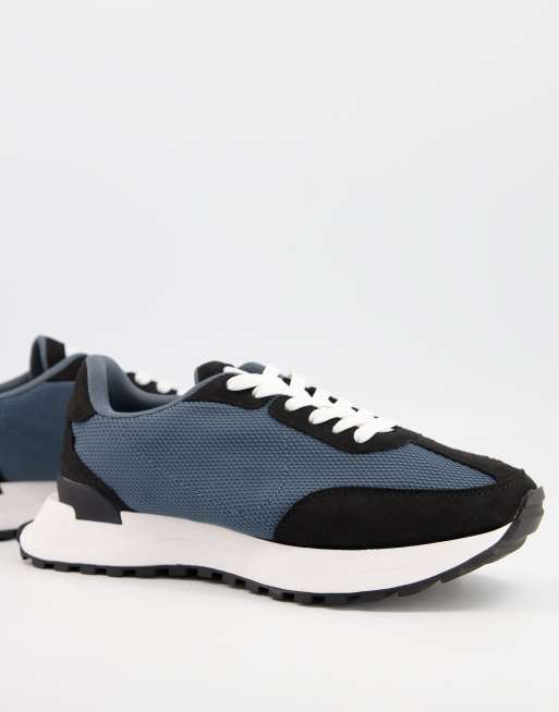 ASOS DESIGN - Sneakers grigie con dettagli sulla suola