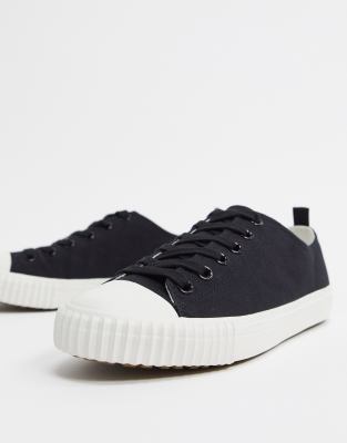 asos design sneakers in white canvas