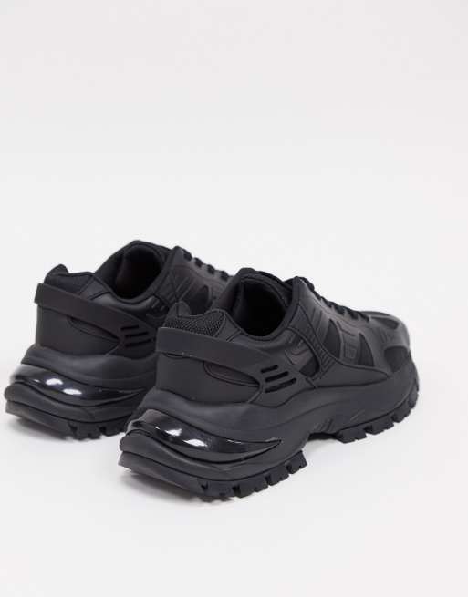 ASOS DESIGN sneakers in black with chunky sole and rubber panels