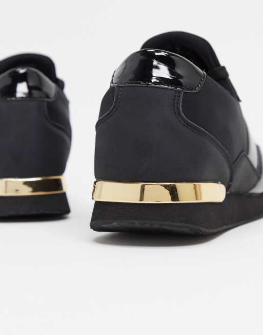 DESIGN sneakers black gold detail | ASOS