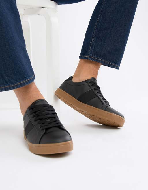 black sneakers gum sole