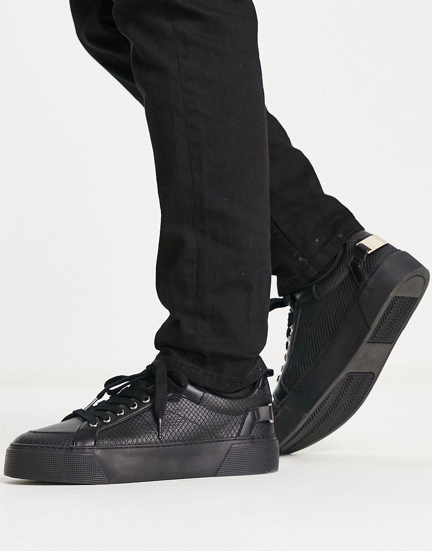 ASOS DESIGN sneakers in black with neoprene sock and gold hardware
