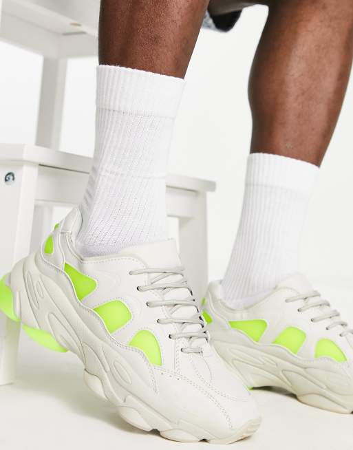 ASOS DESIGN - Sneakers in grijs met tech details op dikke zool