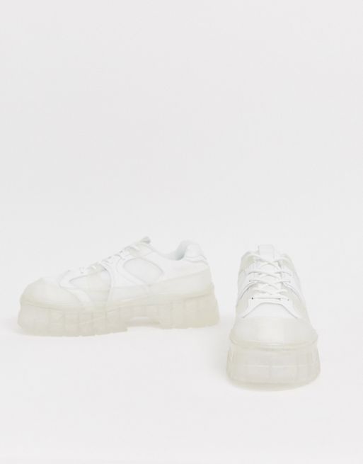 ASOS DESIGN sneakers in white with translucent blue sole