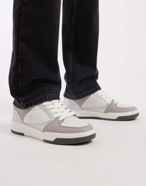ASOS DESIGN sneakers in white and silver - view 1