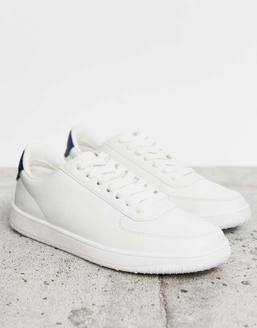 ASOS DESIGN sneakers in white with translucent blue sole