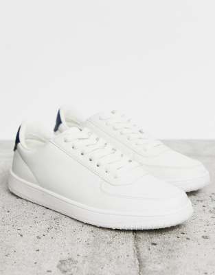 white sneakers with black heel