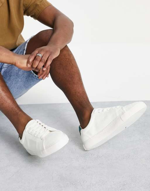 ASOS DESIGN retro sneakers in white with green detail