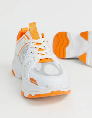 orange color sneakers