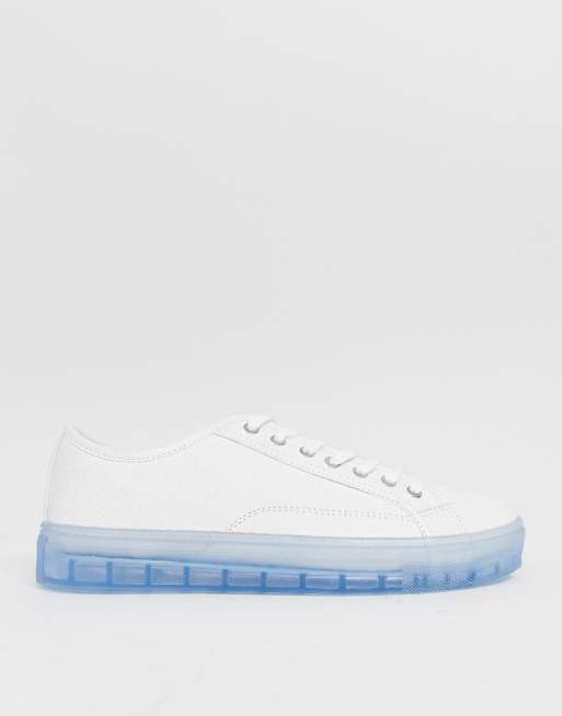 ASOS DESIGN sneakers in white with translucent blue sole