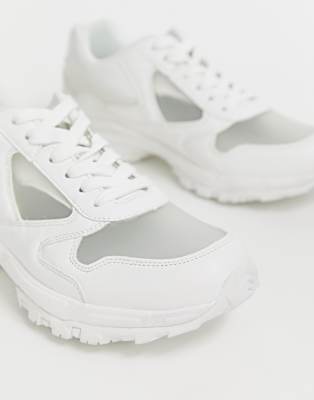 ASOS DESIGN sneakers in white with translucent blue sole