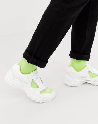 ASOS DESIGN sneakers in white with translucent blue sole