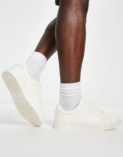 ASOS DESIGN sneakers in white with translucent blue sole