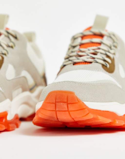 Sneakers met oranje hot sale
