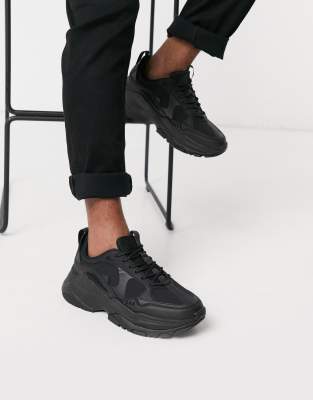 ASOS DESIGN - Sneakers met dikke zool in zwart | ASOS