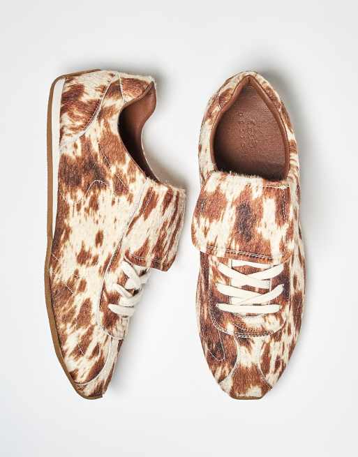 ASOS DESIGN retro sneakers in faux pony print with oversized tongue