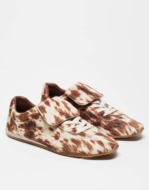 ASOS DESIGN retro sneakers in faux pony print with oversized tongue