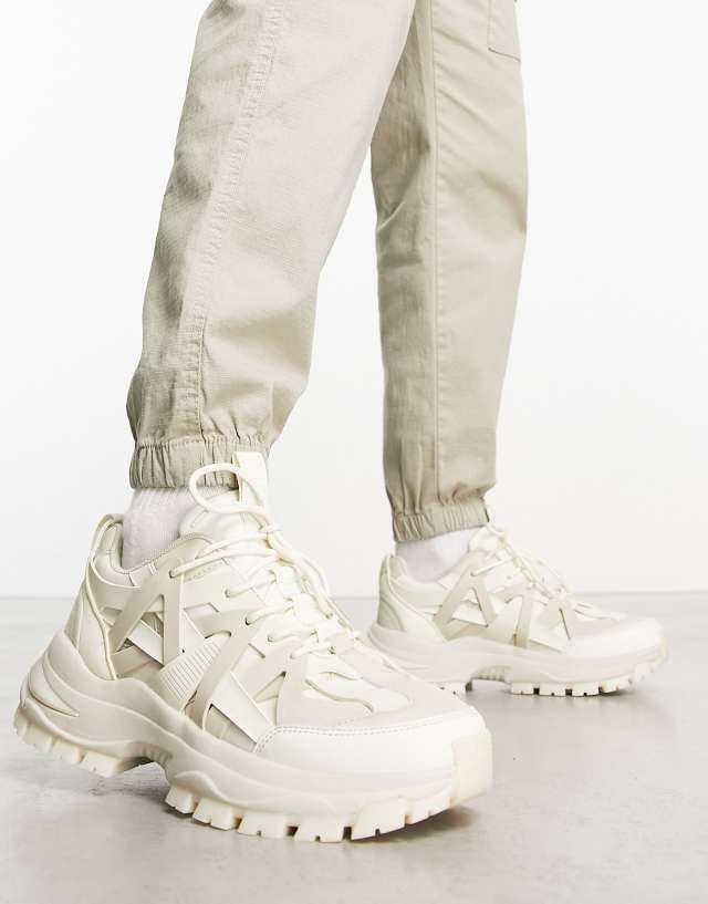 ASOS DESIGN sneakers with multi rubber panels and chunky sole in stone