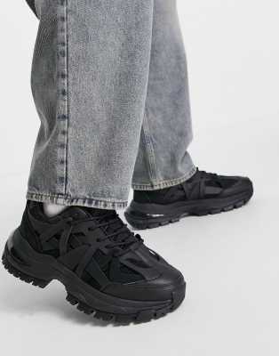 asos design trainer shoes in black leather with chunky sole