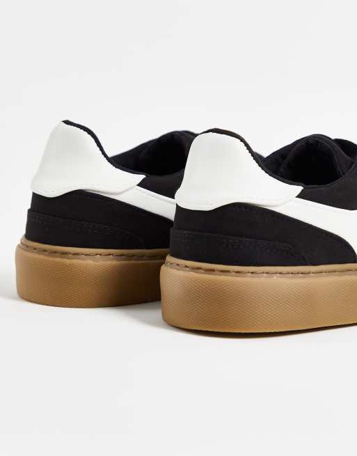 ASOS DESIGN sneakers with side details with gum sole