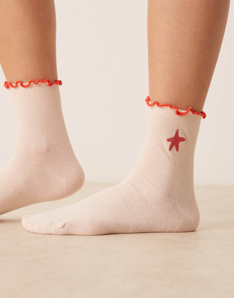 ASOS DESIGN socks with embroidered star fish deisgn in pink - view 1