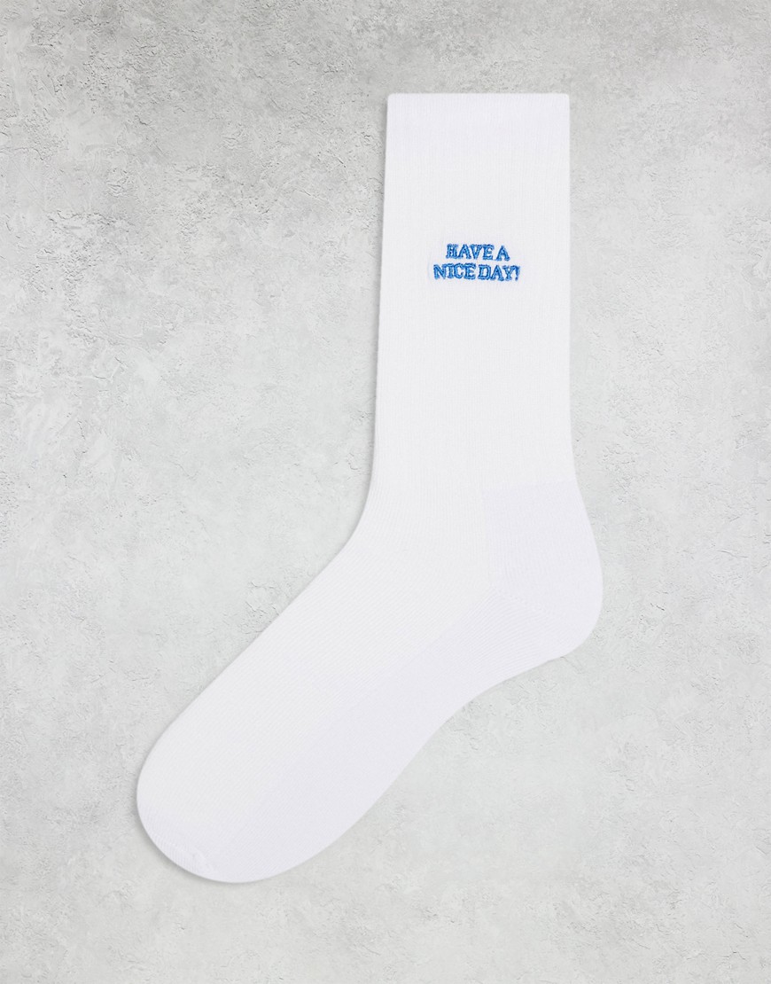 ASOS DESIGN socks with have a nice day slogan in white