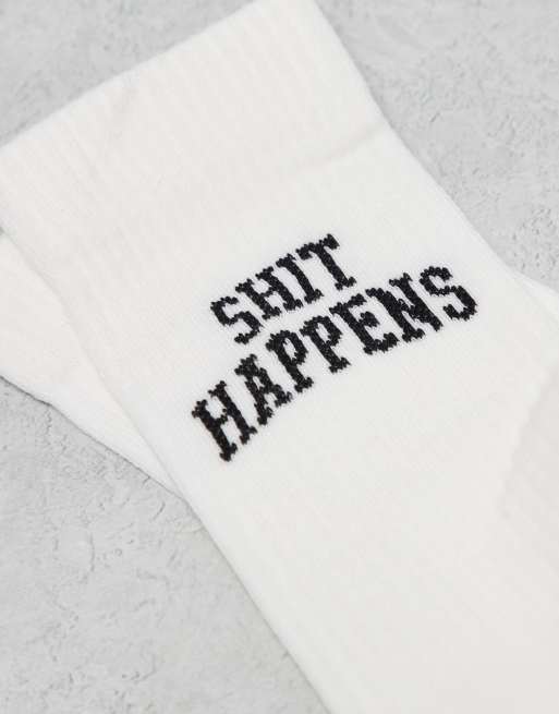 ASOS DESIGN socks with shit happens artwork in white