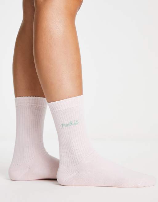 ASOS DESIGN socks with slogan in pastel pink
