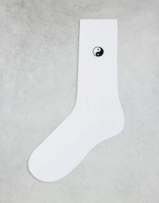 socks with yin yang embroidery in white